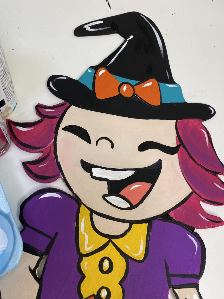 Painted Witch Halloween Door Hanger Close-Up Shot by Southern ADOOrnments