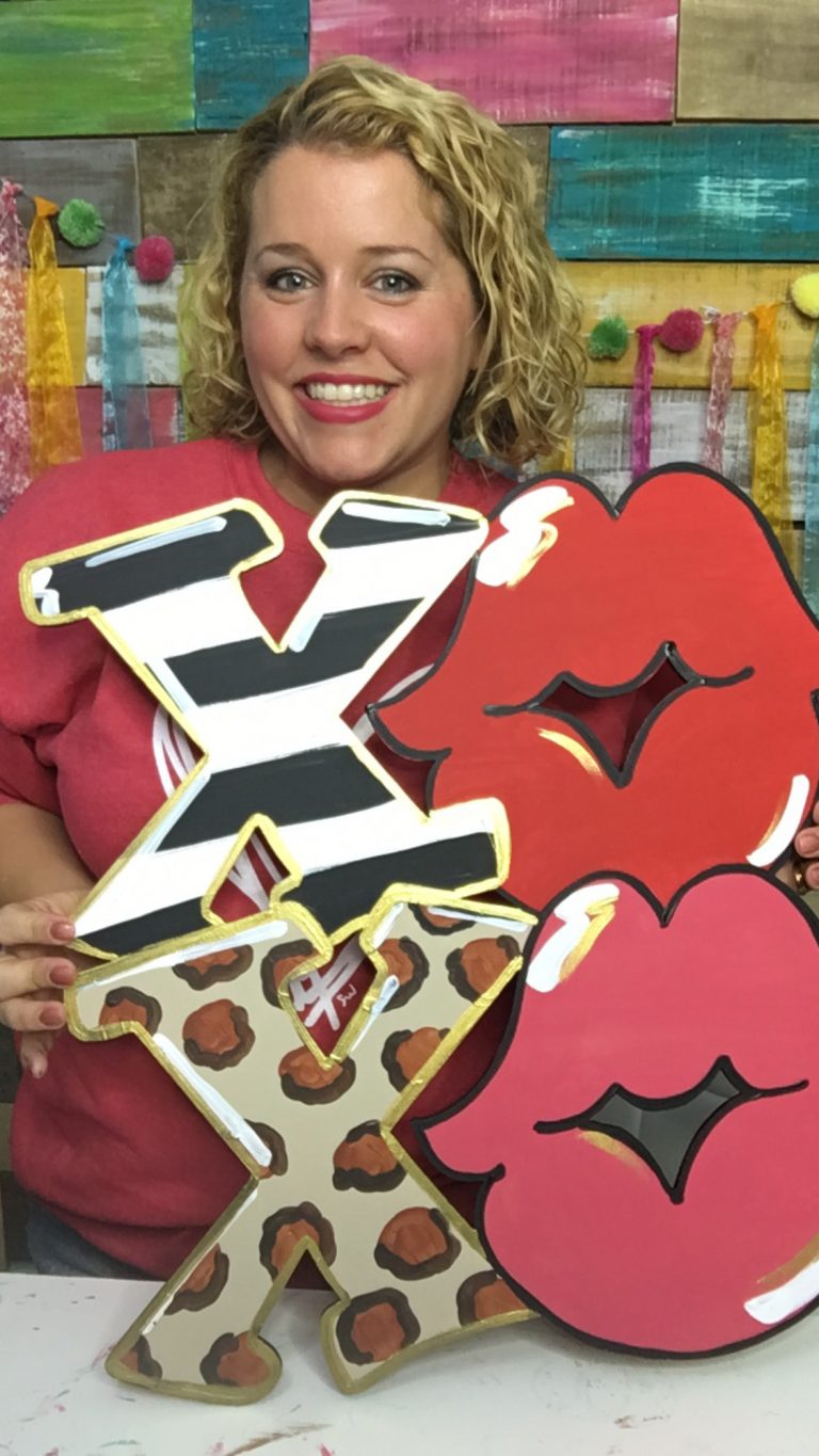 Tamara holding XOXO Valentine's Day Lips Kisses Door Hanger