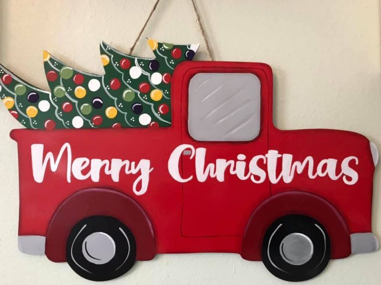 Red vintage truck with christmas tree by Pam Savage