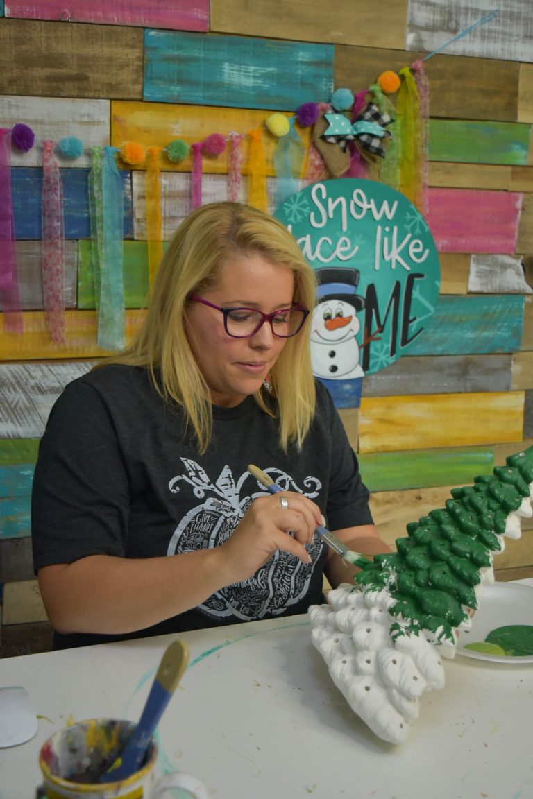 Tamara Bennett Painting a Ceramic Christmas Tree