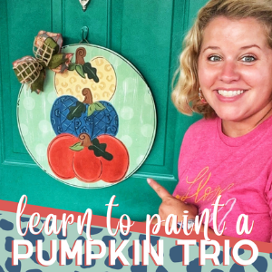 Tamara with Pumpkin Trio door hanger