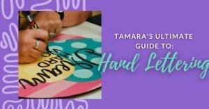 photo of someone hand lettering a door hanger that says "Dream hard" and wording that says "Tamara's Ultimate Guide to Hand Lettering"