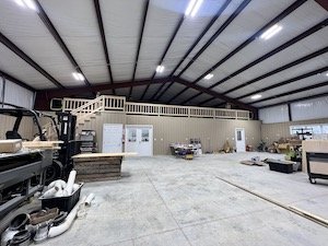 view of shop with loft above break room